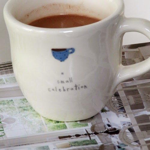 White ceramic mug of chocolat chaud, hot drinking chocolate made with cream. milk and bittersweet chocolate