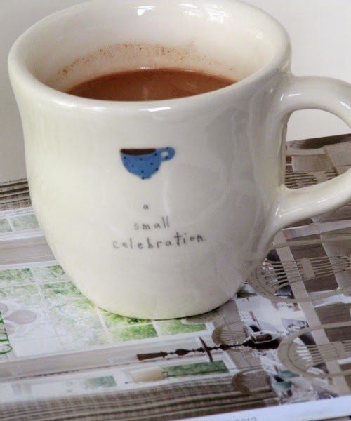 White ceramic mug of chocolat chaud, hot drinking chocolate made with cream. milk and bittersweet chocolate