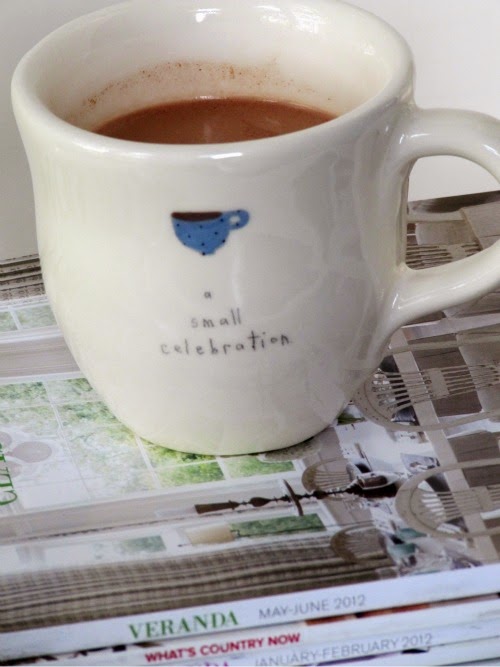 White ceramic mug of chocolat chaud, hot drinking chocolate made with cream. milk and bittersweet chocolate.