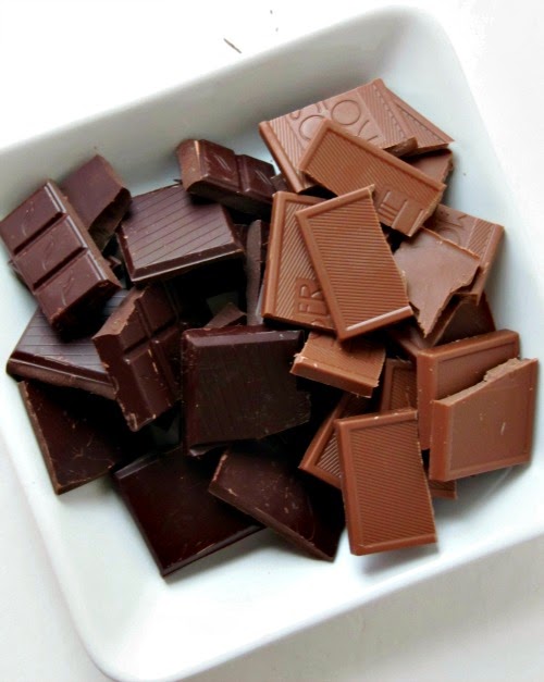 top view of square white tray holding dark chocolate and milk chocolate to make Master Blend hot chocolate dry mix