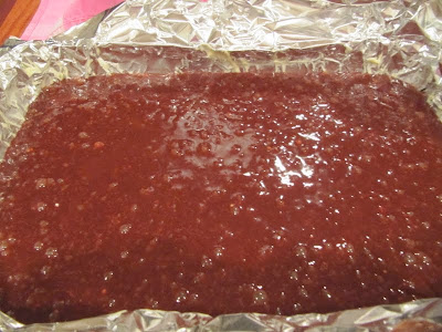 A tin foil lined pan of batter for Brownies From Once Upon A Tart.