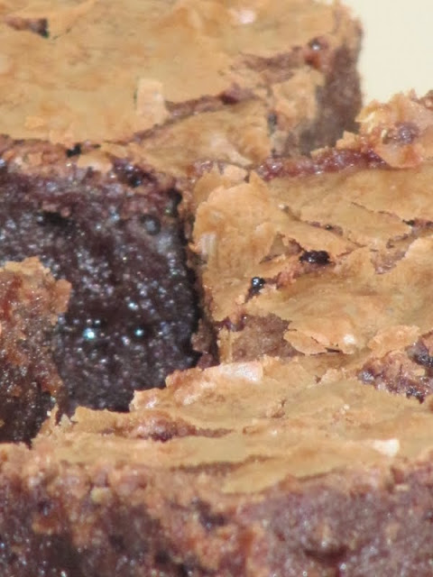 Asuper closeup shot of the tops and sides of Brownies From the Once Upon A Tart cookbook.