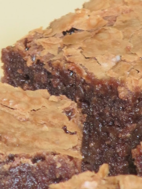 Closeup of Brownies From Once Upon A Tart with crinkly tops and moist centers.